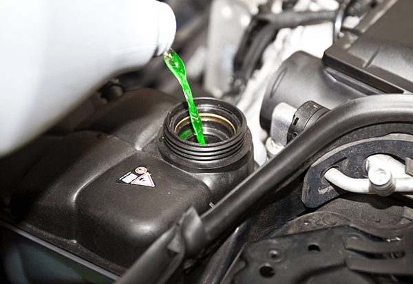 car coolant being poured