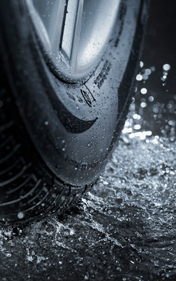 car tire on wet road