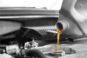 oil pouring in car engine